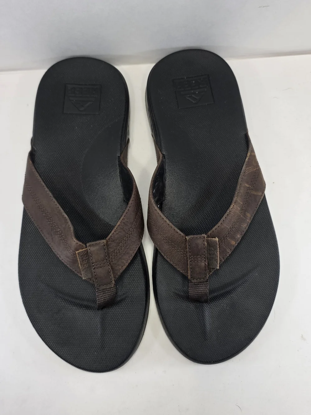 Reef Men's Black Footbed Brown Strap Flip Flop Sandals
